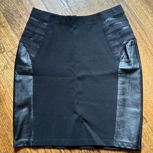 Alice and Olivia black nylon stretch mini skirt with leather trim on sides